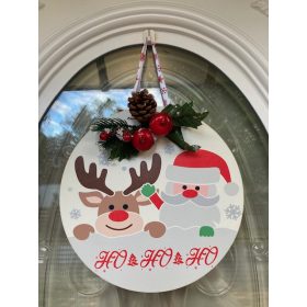 Karácsonyi ajtódísz rénszarvassal és télapóval