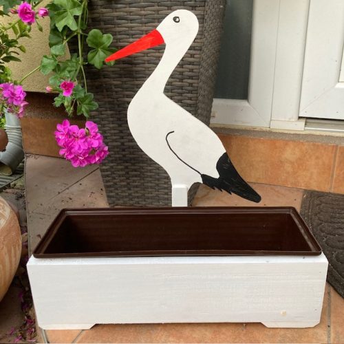 Virágláda gólyával